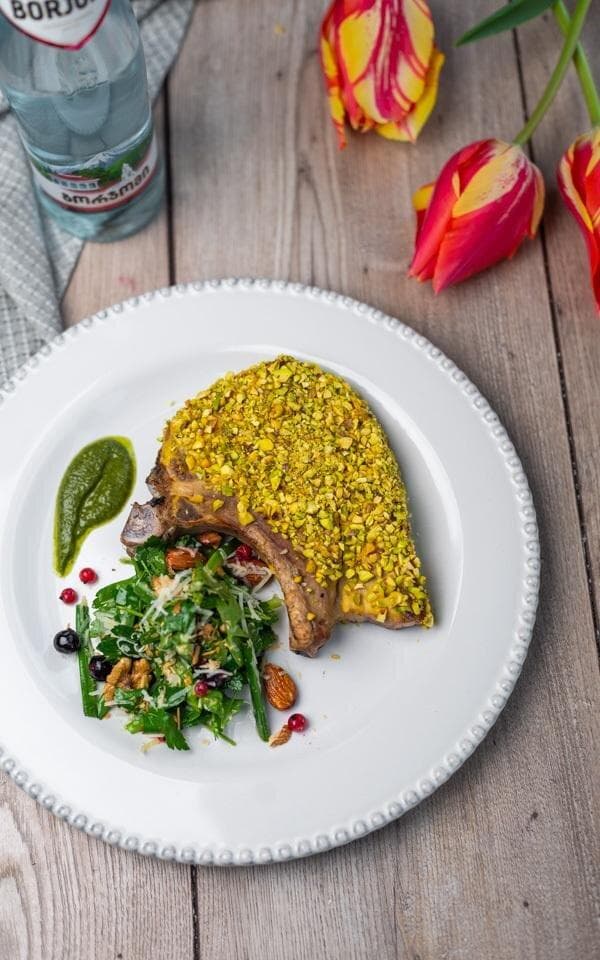 Pork ribs with mint sauce and greens